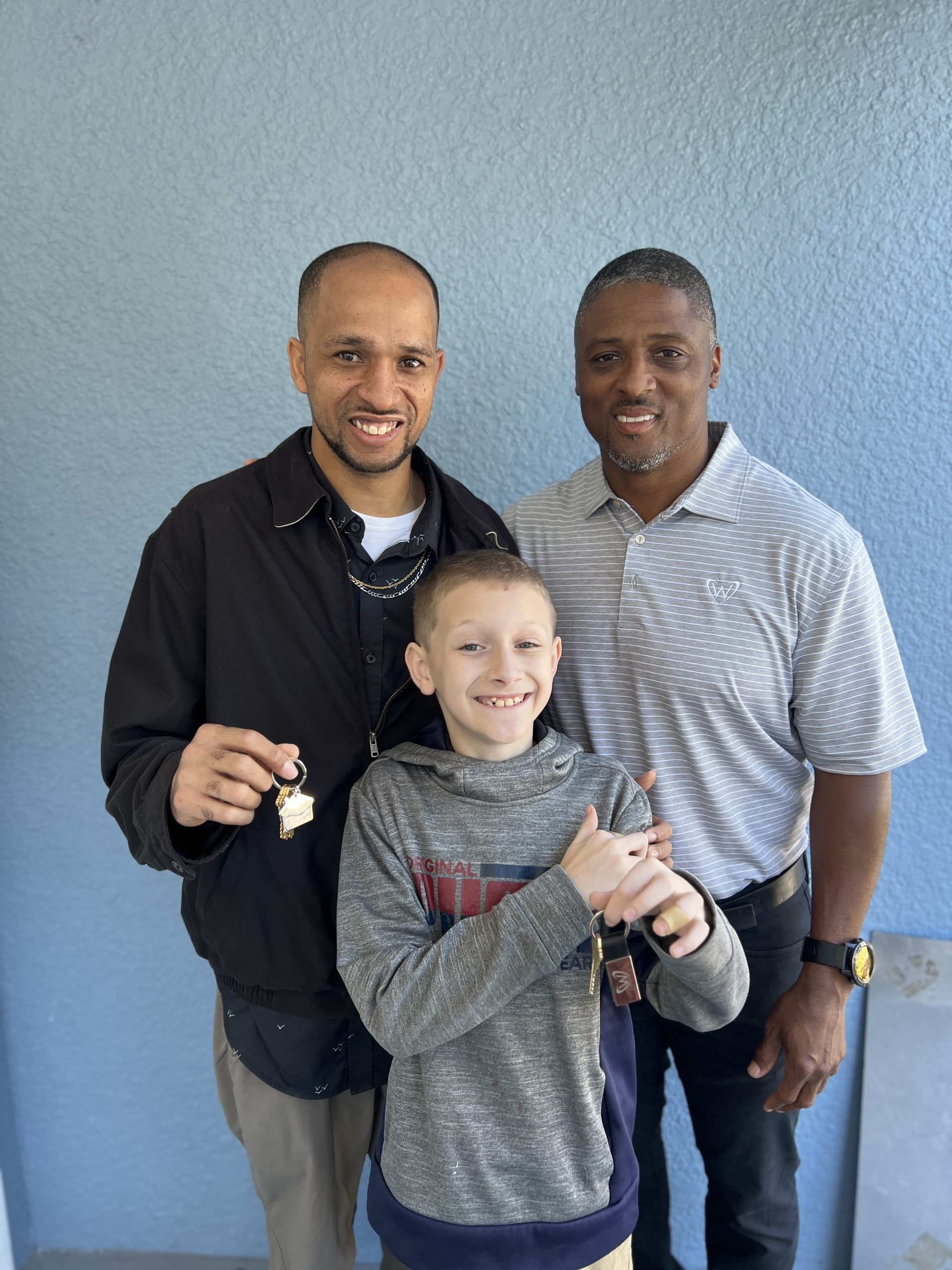 Warrick Dunn Delivers Clearwater Home Surprise with Habitat